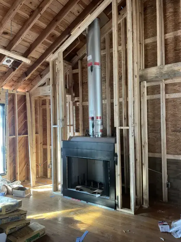 Fireplace construction project in progress at a Charleston area home
