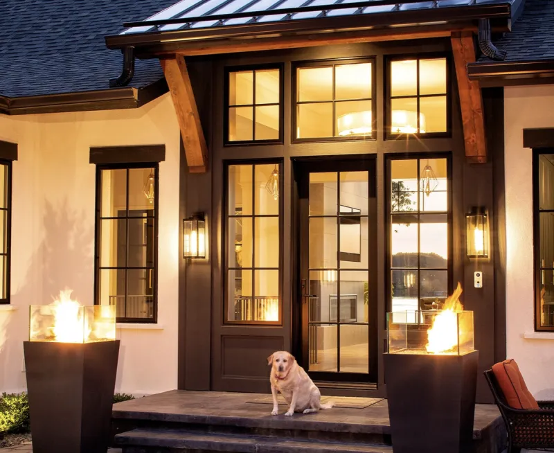 Acucraft outdoor fire features flanking front entrance