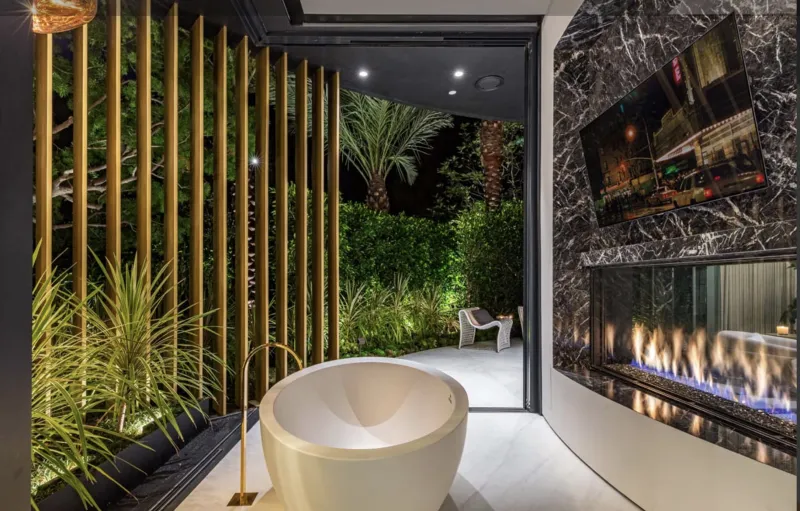 Acucraft custom four-sided glass box fireplace