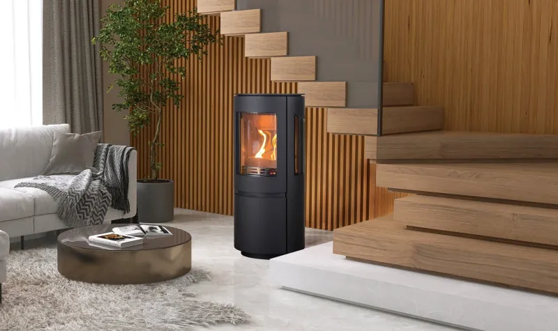 Element 4 Ovation freestanding stove next to wooden staircase