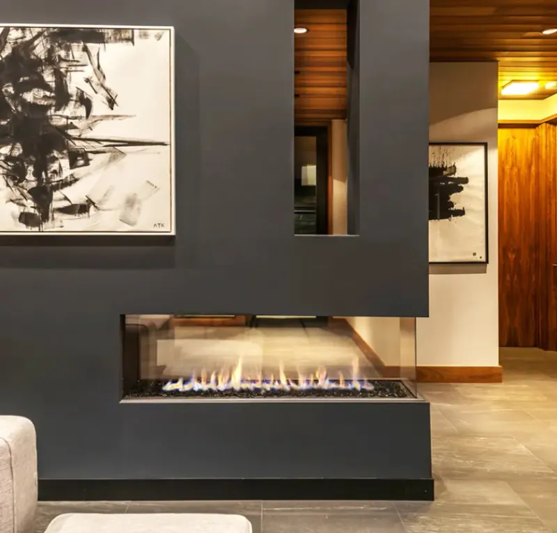 Element 4 Lucius 140 peninsula fireplace in dark modern interior