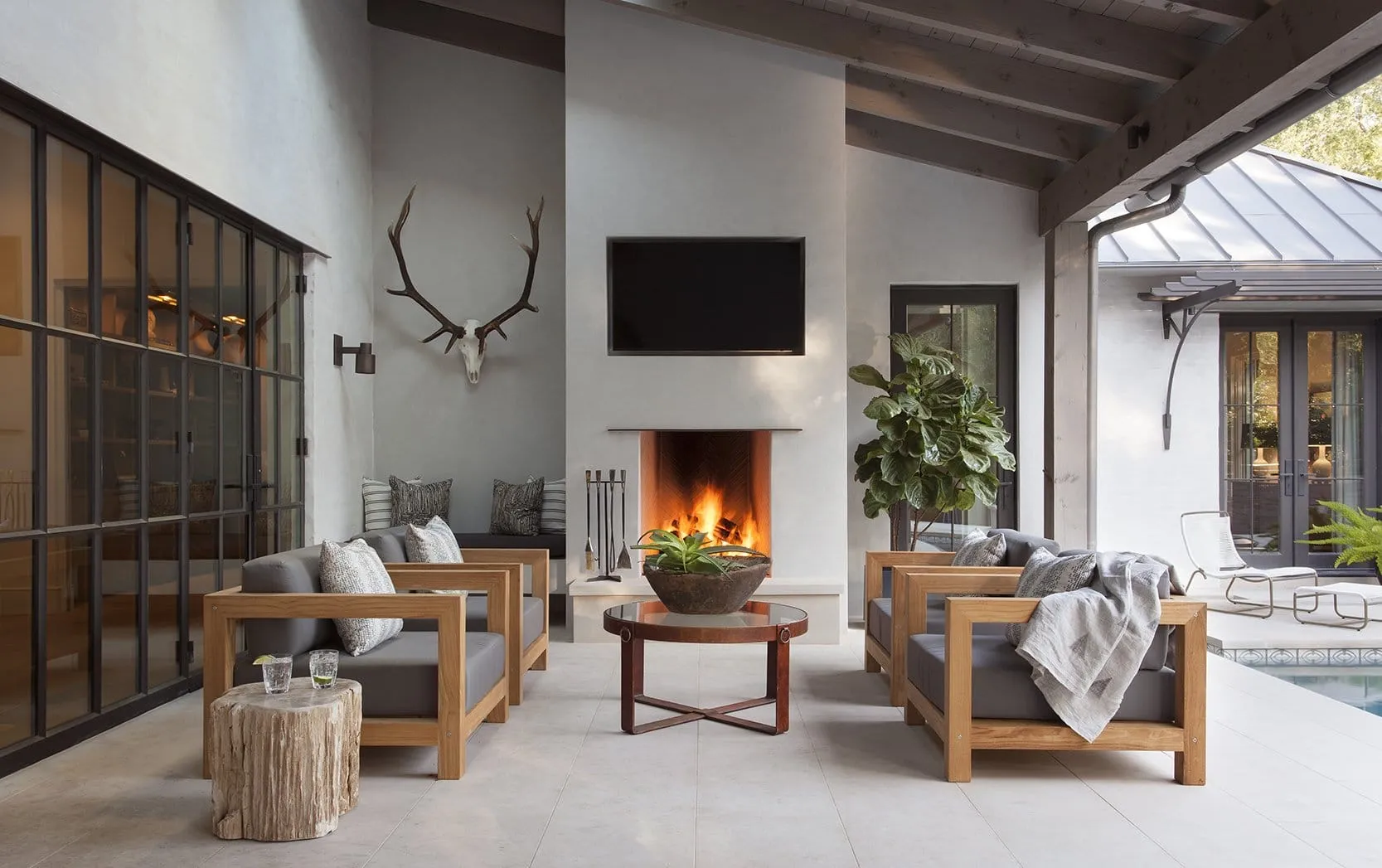 Isokern Magnum Series fireplace in modern living space with exposed beams