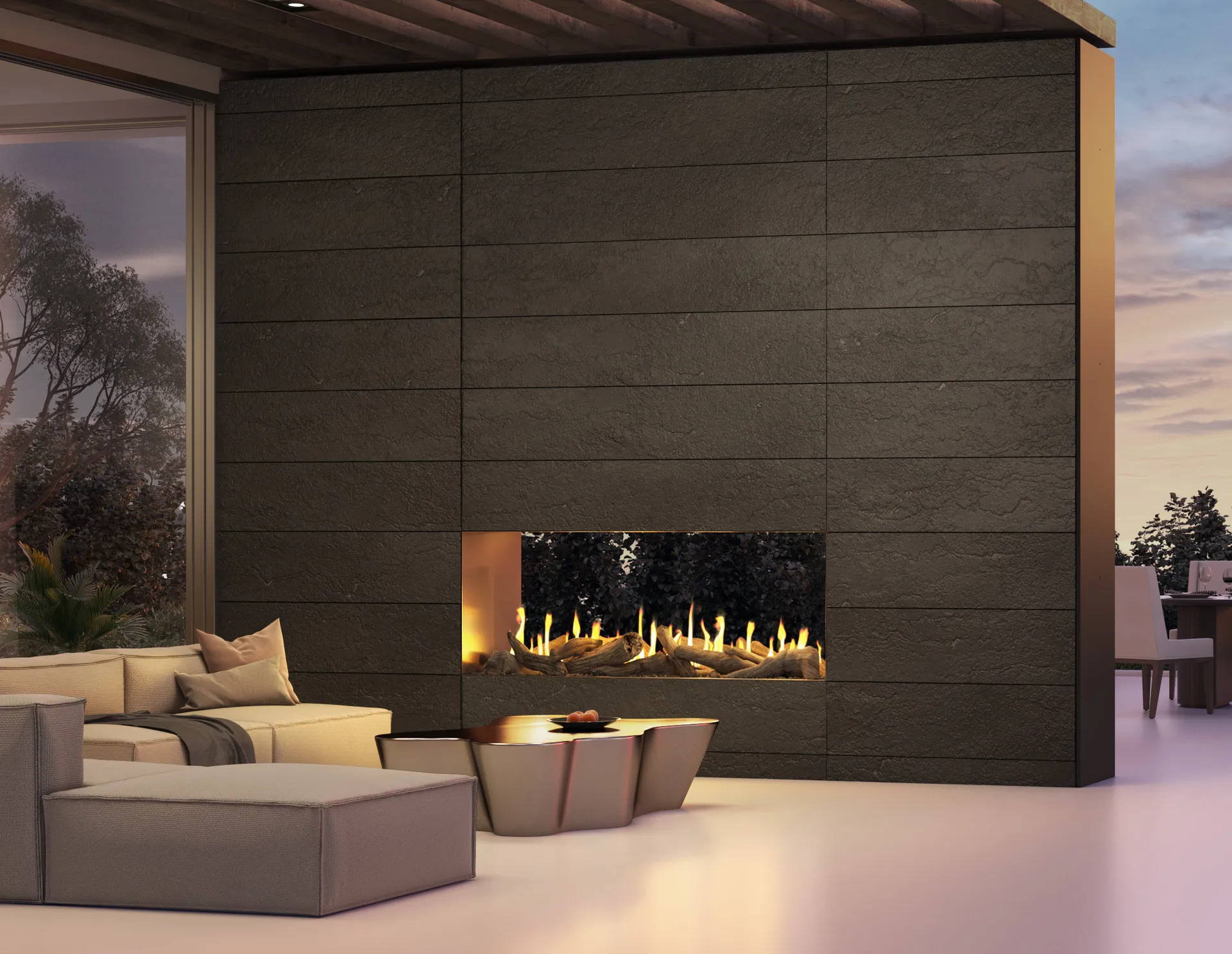 Stellar custom indoor-outdoor fireplace at sunset with modern seating